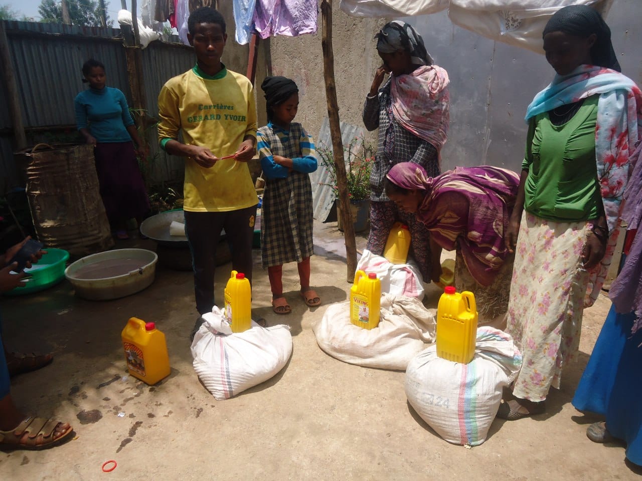 Mothers collecting emergency food support